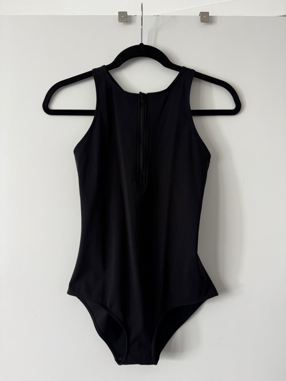 TNA1/4 Zip Bodysuit. NWOT unworn. Size XS